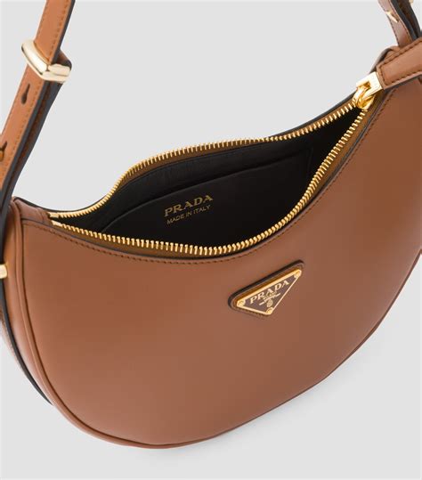 prada brown leather bag.